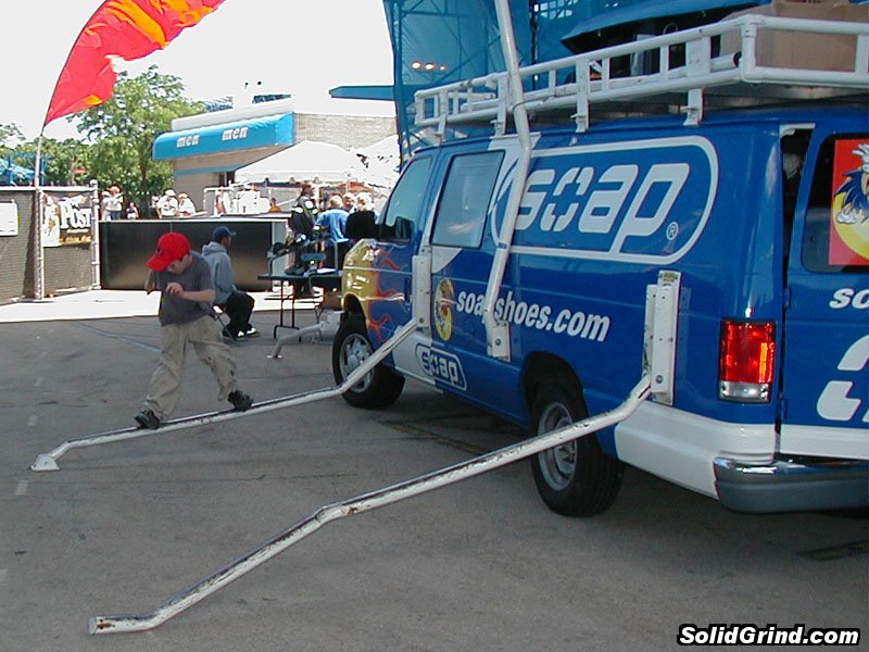 A kid sliding on the Soap Van
