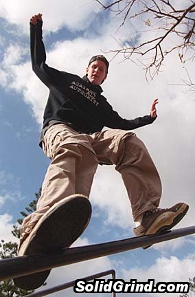 Paul Costello, 16, of Hawaii Kai gives his Soap shoes a whirl on a metal railing at Hahaione Park.