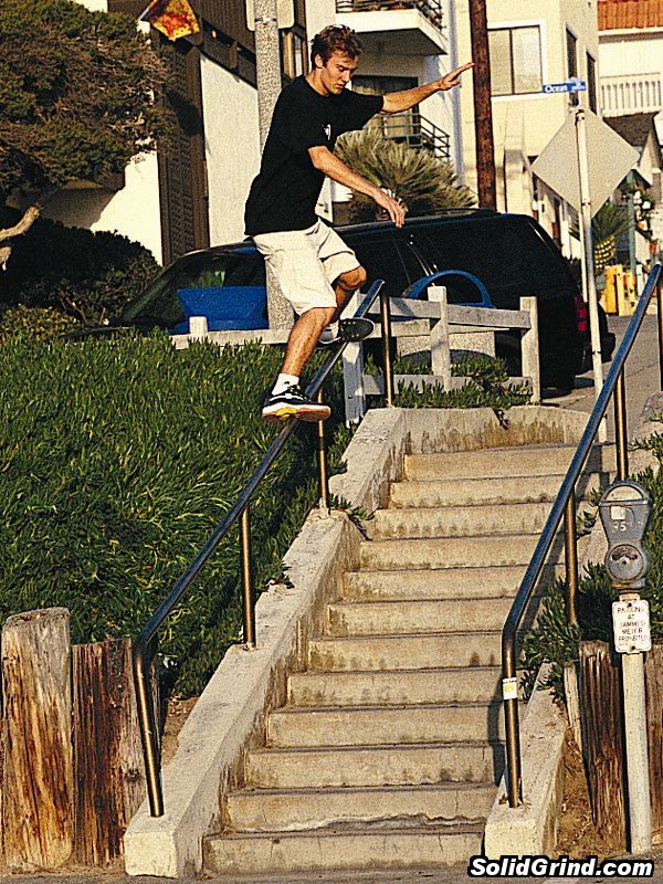 Bryndon with a frontside (about to jump from rail 1 to rail 2).