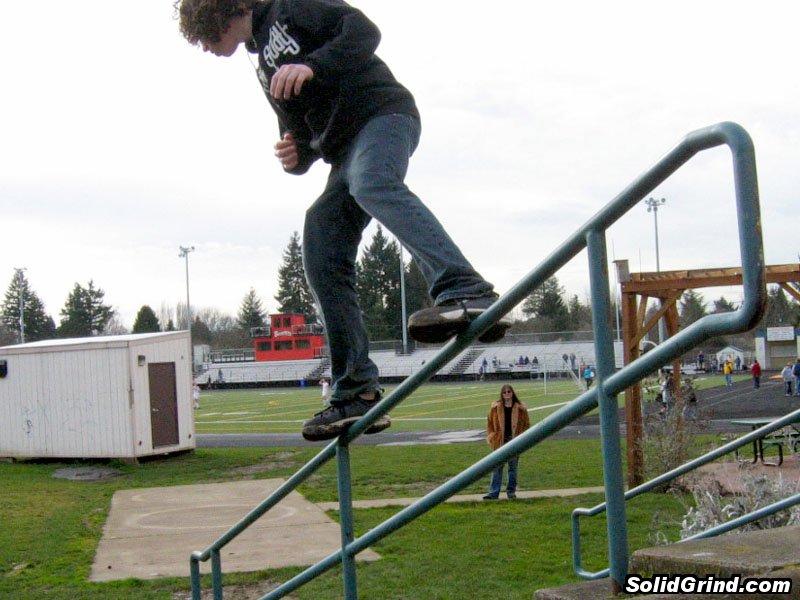 Benji with a frontside on our high school's 10 stair.