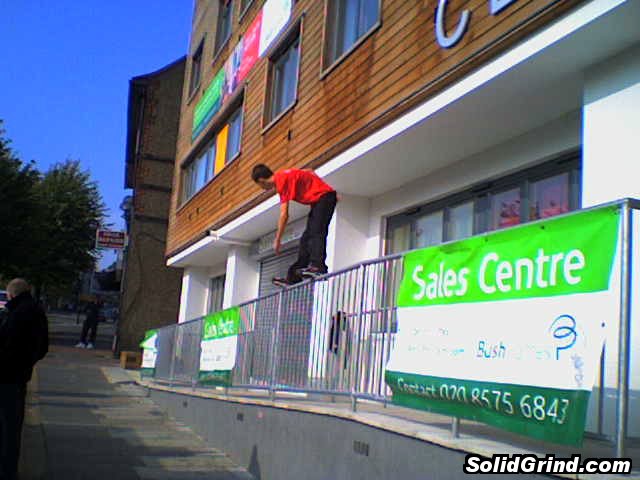 Stu hitting a frontside on the high sales rail