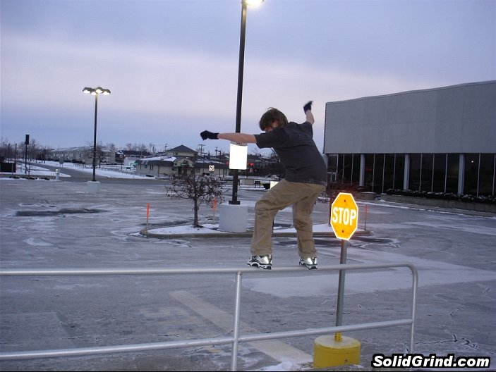 sam grinding a high rail