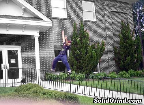 Jay (D.V.) Grinding the huge rail outside of his church.