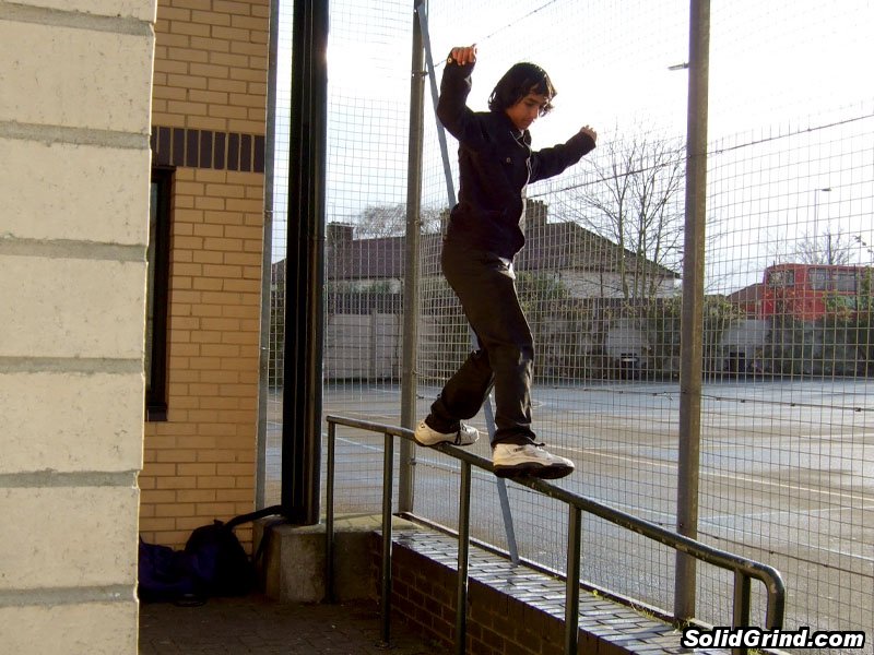 Damian Zoil hitting a UFO on the school Gym Rail