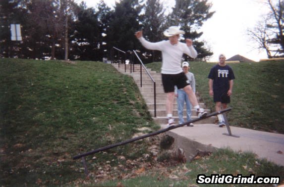 Joe Wallace with a cowboy hat, shorts, and long underwear...