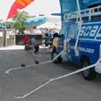 A kid sliding on the Soap Van