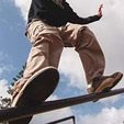 Paul Costello, 16, of Hawaii Kai gives his Soap shoes a whirl on a metal railing at Hahaione Park.