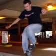 Zach larson with a Christ Grind in a Des Moines parking garage