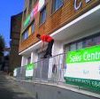 Stu hitting a frontside on the high sales rail