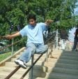 Victor Sierra sticking a Sidewalk on the John Bowne School rail
