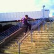 Stuart Pickston frontsiding the gurnell swimming pool rail