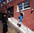 Aaron Stunkard hittin a Sliding a pink handrail